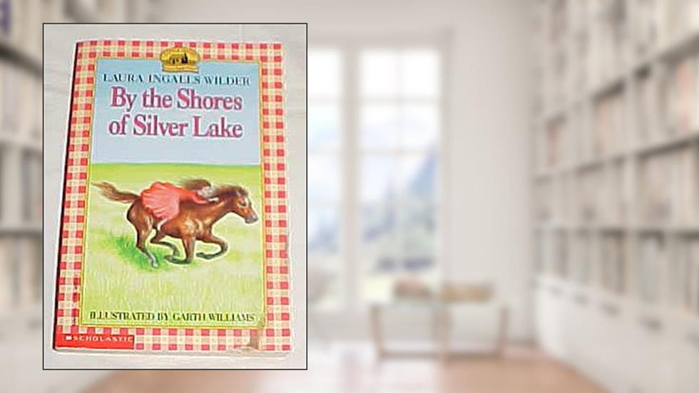 By The Shores of Silver Lake by Laura Ingalls Wilder Paperback 1967, written by Laura Ingalls Wilder