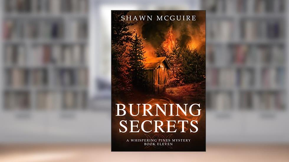 Burning Secrets: A Whispering Pines Mystery, Book 11, written by Shawn McGuire