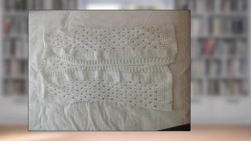 Cover from knit, Swirl! Uniquely Flattering, One Piece, One Seam Swirl Jackets; Foreword by Cat Bordhi, written by Sandra McIver