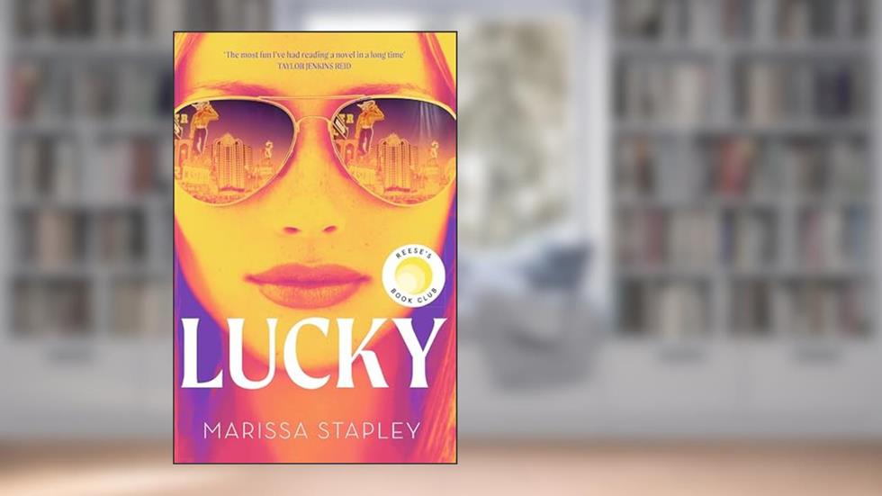 Lucky: A Reese Witherspoon Book Club Pick about a con-woman on the run, written by Marissa Stapley