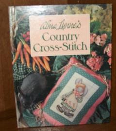 Allma Lynne's Country Cross Stitch, written by Alma Lynne