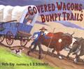Read Covered Wagons, Bumpy Trails, written by Verla Kay