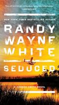 Read Seduced (A Hannah Smith Novel), written by Randy Wayne White