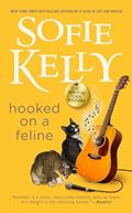 Read Hooked on a Feline (Magical Cats), written by Sofie Kelly